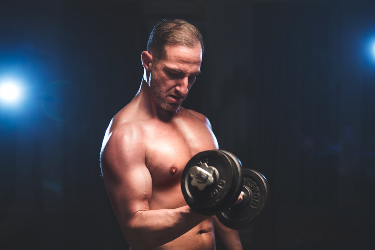 Fit man over 50 performing strength training exercise
